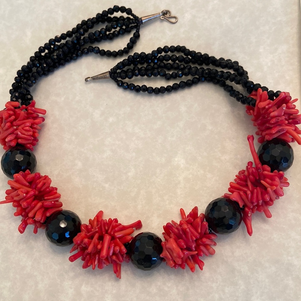 Jet and coral necklace, 5 strand. Jet beads are faceted. 5 large jet beads.